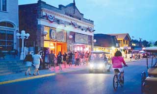 Put-in-Bay - A vintage photo of the main strip showing bars, restaurants and shops.