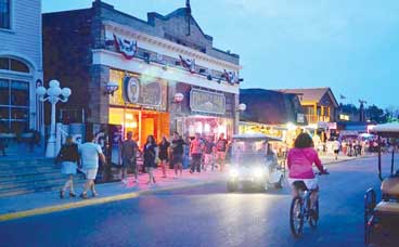 Put-in-Bay - A vintage photo of the main strip showing bars, restaurants and shops.